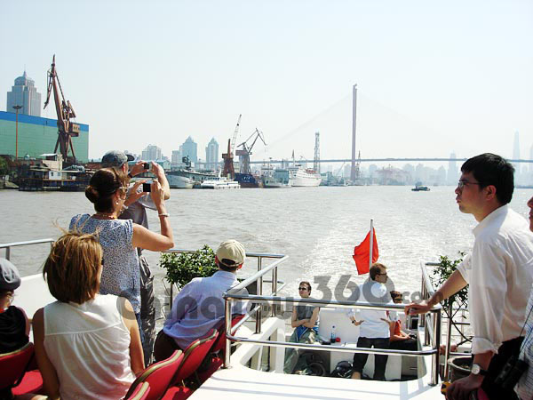 Our guests enjoy the sights along the Huangpu River
