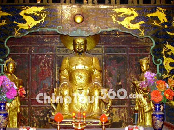 Three copper statues in the Golden Temple