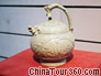 Celadon Bottom-filled-in Kettle with a Loop Handle, Five Dynasties