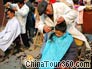 Hair-Cutting Stands in Kaili Market