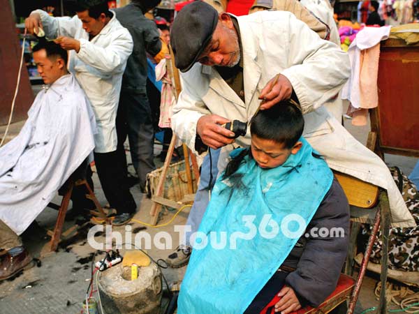 Hair-Cutting Stands in Kaili Market