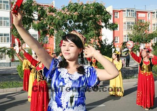 Uigur People in Traditional Costume