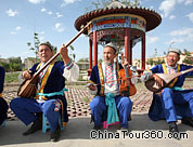 A Uigur family visit, Xinjiang